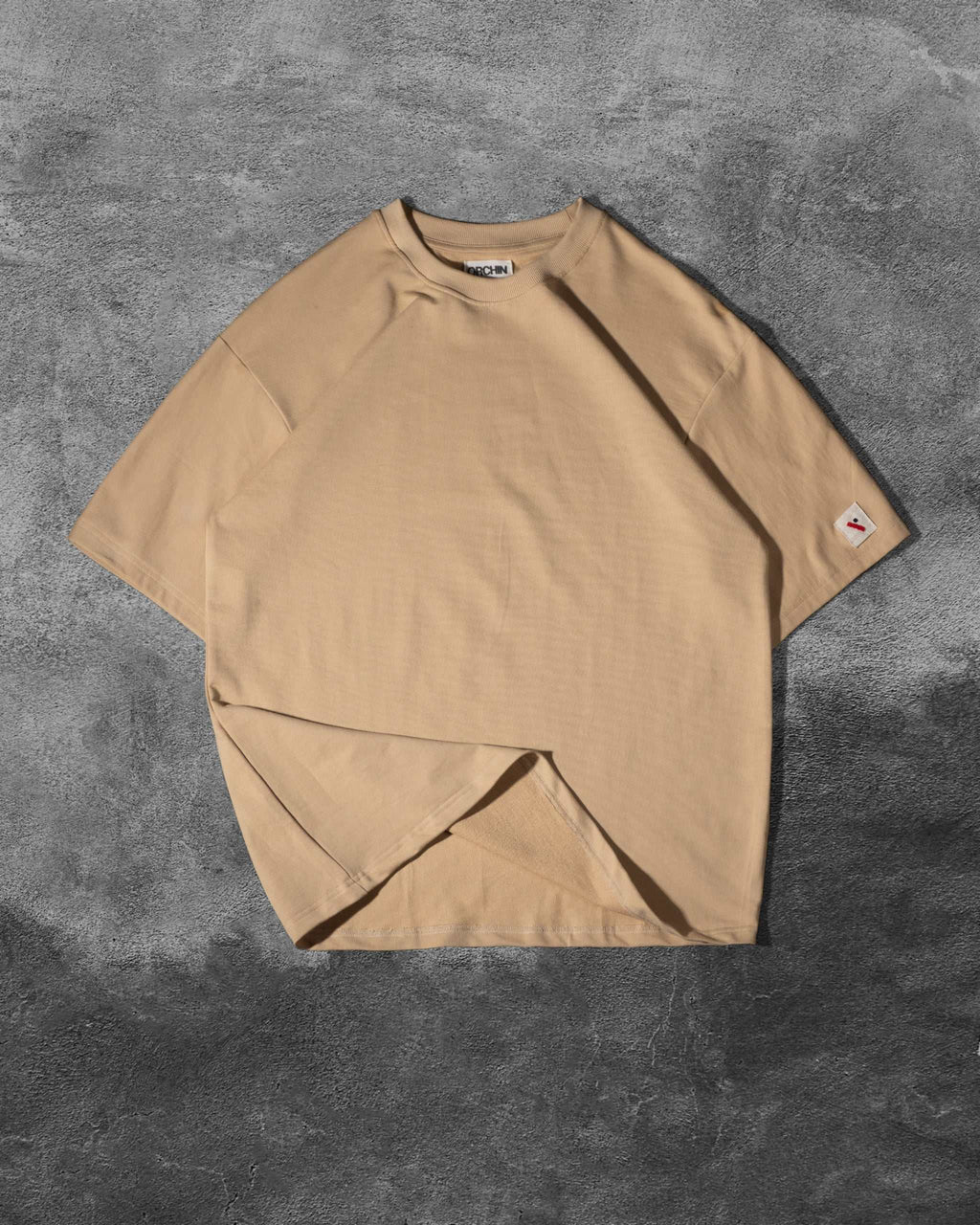 Oversized Cotton Basics beige cotton terry t-shirt with relaxed fit and subtle embroidered branding