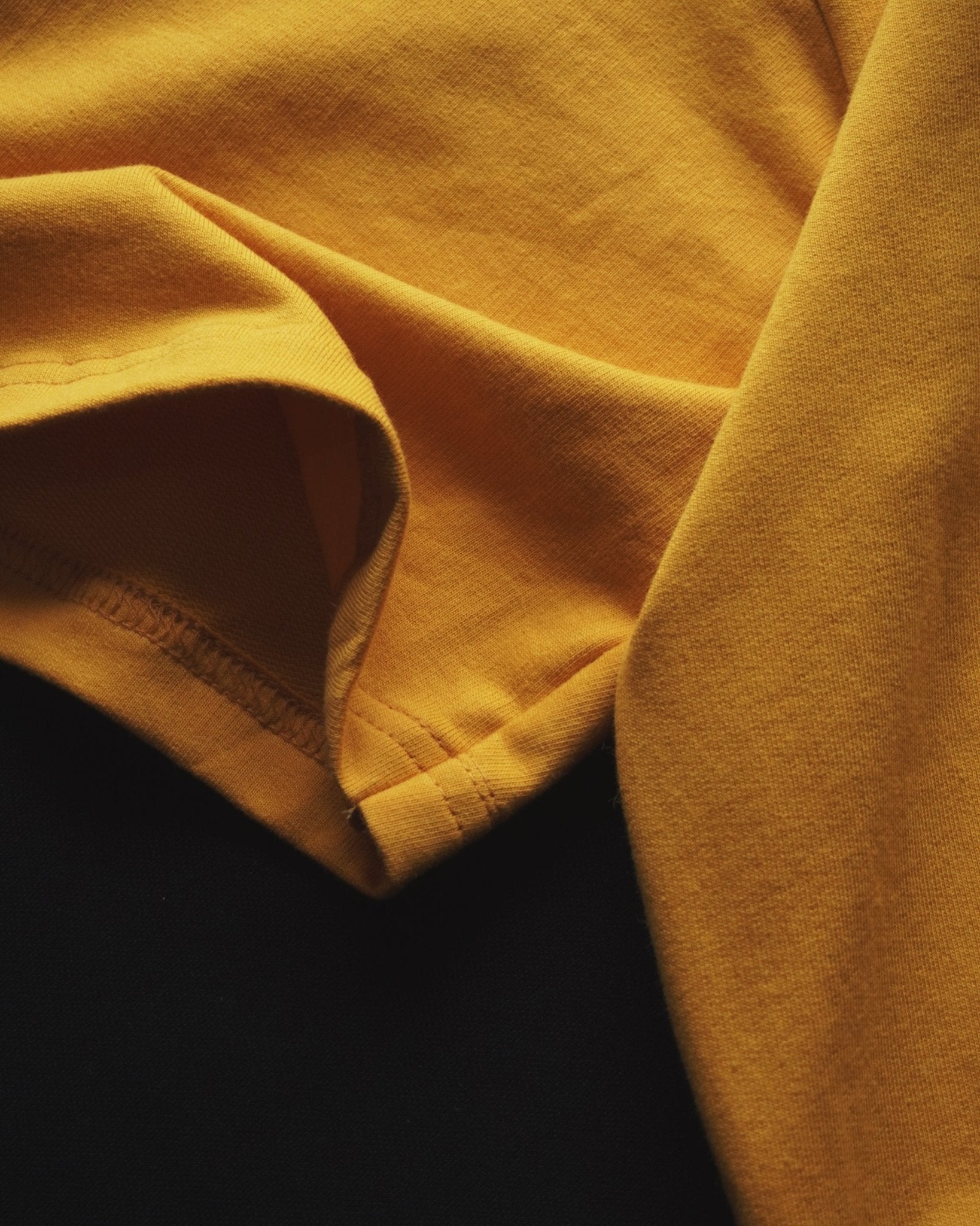 Oversized cotton basics mustard yellow t-shirt with relaxed fit and soft bio-washed fabric