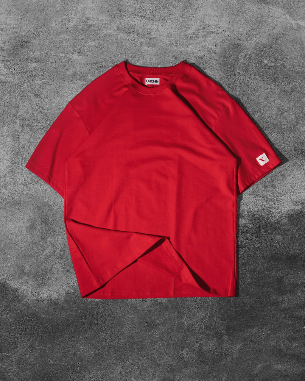Red oversized cotton basics t-shirt made from 240 GSM bio-washed cotton terry fabric with relaxed fit and subtle embroidered branding