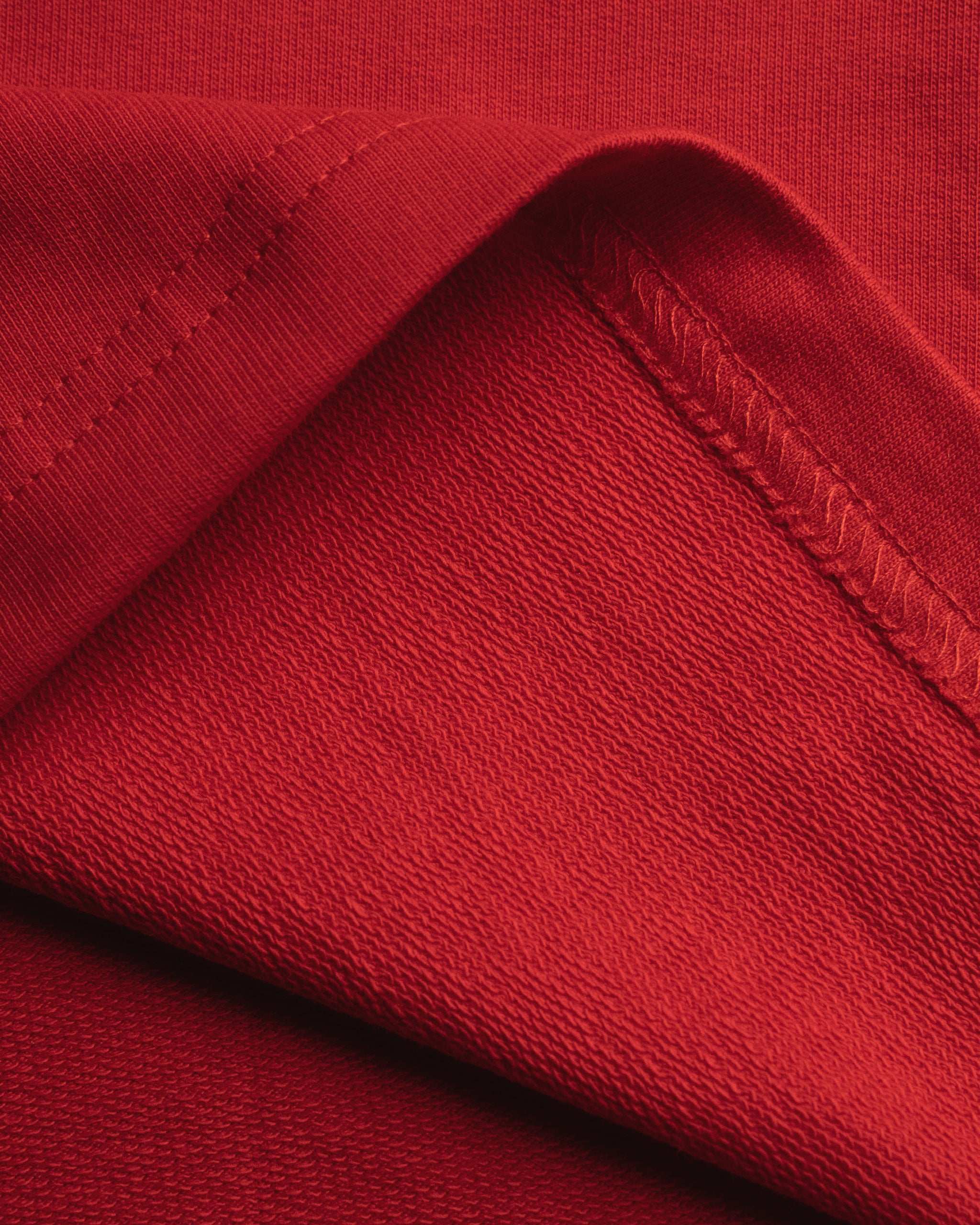 Red oversized cotton basics t-shirt with relaxed fit and subtle embroidery